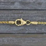 Armband als Zopfkette in Gelbgold 585 / 14K, 18,5 cm lang, 1,7 mm breit, Gewicht ca. 2.2 g.
