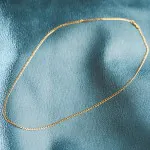 Goldkette als Panzerkette weit in Gelbgold 375 / 9 Karat, 100 cm lang, 2.6 mm breit, Gewicht ca. 6.5 g.
