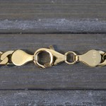 Goldkette als Panzerkette facettiert in Gelbgold 585 / 14K, 75 cm lang, 5 mm breit, Gewicht ca. 20.1 g.