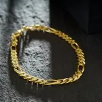 Armband als Figarokette diamantiert in Gelbgold 585 / 14K, 21 cm lang, 5,3 mm breit, Gewicht ca. 13.9 g.