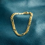 Armband als Figarokette diamantiert in Gelbgold 585 / 14K, 21 cm lang, 5,3 mm breit, Gewicht ca. 13.9 g.