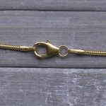 Goldkette als Schlangenkette in Gelbgold 585 / 14K, 42 cm lang, 1,2 mm breit, Gewicht ca. 3.8 g.