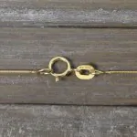 Goldkette als Schlangenkette in Gelbgold 585 / 14K, 60 cm lang, 0,8 mm breit, Gewicht ca. 3.1 g.