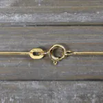 Goldkette als Schlangenkette in Gelbgold 585 / 14 Karat, 65 cm lang, 1.1 mm breit, Gewicht ca. 6,9 g.