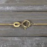 Goldkette als Schlangenkette in Gelbgold 585 / 14K, 40 cm lang, 1,1 mm breit, Gewicht ca. 4.3 g.
