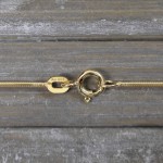 Goldkette als Schlangenkette in Gelbgold 585 / 14K, 45 cm lang, 1,1 mm breit, Gewicht ca. 4.8 g.