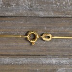 Goldkette als Schlangenkette diamantiert in Gelbgold 585 / 14K, 34 cm lang, 0,9 mm breit, Gewicht ca. 3.2 g.