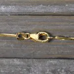Goldkette als Schlangenkette diamantiert in Gelbgold 585 / 14K, 50 cm lang, 1 mm breit, Gewicht ca. 5.9 g.