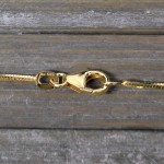 Goldkette als Schlangenkette diamantiert in Gelbgold 585 / 14K, 36 cm lang, 1 mm breit, Gewicht ca. 4.2 g.