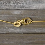 Goldkette als Tondakette in Gelbgold 585 / 14K, 50 cm lang, 0,8 mm breit, Gewicht ca. 3.5 g.