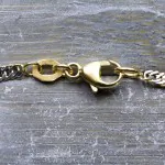 Armband als Singapurkette in Bicolor Gelbgold / Weißgold 585 / 14K, 18 cm lang, 2.4 mm breit, Gewicht ca. 1.9 g.