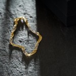 Armband als Singapurkette in Gelbgold 750 / 18 Karat, 20 cm lang, 2.9 mm breit, Gewicht ca. 3.4 g.