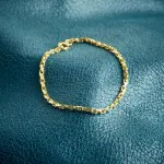 Armband als Ankerkette diamantiert in Gelbgold 585 / 14K, 21 cm lang, 2,5 mm breit, Gewicht ca. 7.3 g.