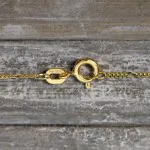 Goldkette als Figarokette diamantiert in Gelbgold 585 / 14K, 45 cm lang, 1,1 mm breit, Gewicht ca. 1.5 g.