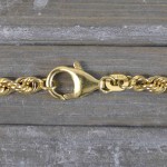 Armband als Kordelkette hohl in Gelbgold 585 / 14K, 21 cm lang, 5 mm breit, Gewicht ca. 7.6 g.