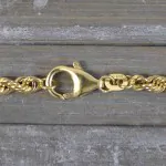 Armband als Kordelkette hohl in Gelbgold 585 / 14K, 20 cm lang, 4.4 mm breit, Gewicht ca. 5.9 g.