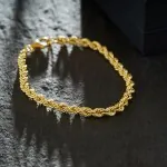 Armband als Kordelkette hohl in Gelbgold 585 / 14K, 20 cm lang, 4.4 mm breit, Gewicht ca. 5.9 g.
