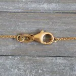 Goldkette als Ankerkette flach in Gelbgold 750 / 18K, 50 cm lang, 1.2 mm breit, Gewicht ca. 2.7 g.