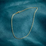 Goldkette als Ankerkette diamantiert in Gelbgold 750 / 18K, 38 cm lang, 1,3 mm breit, Gewicht ca. 2.8 g.