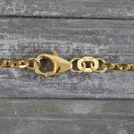 Goldkette als Ankerkette diamantiert in Gelbgold 750 / 18K, 34 cm lang, 1,9 mm breit, Gewicht ca. 6 g.