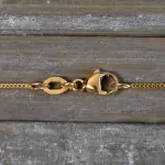 Goldkette als Panzerkette flach in Gelbgold 750 / 18K, 36 cm lang, 1,1 mm breit, Gewicht ca. 1.9 g.
