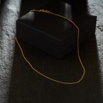 Goldkette als Panzerkette flach in Gelbgold 750 / 18K, 80 cm lang, 1,2 mm breit, Gewicht ca. 5.5 g.