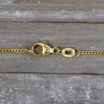 Goldkette als Panzerkette flach in Gelbgold 750 / 18K, 38 cm lang, 1,2 mm breit, Gewicht ca. 2.6 g.