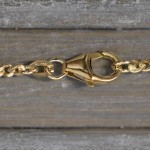 Goldkette als Panzerkette flach 1.1 Höhe in Gelbgold 750 / 18K, 50 cm lang, 2,4 mm breit, Gewicht ca. 11.3 g.