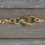 Goldkette als Panzerkette flach 1.1 Höhe in Gelbgold 750 / 18 Karat, 40 cm lang, 2.4 mm breit, Gewicht ca. 9,1 g.
