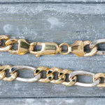 Armband als Figarokette hohl in Weißgold 750 / 18 Karat, 22 cm lang, 5.7 mm breit, Gewicht ca. 7,1 g.