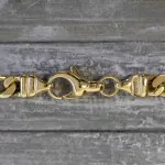 Armband als Figarokette diamantiert in Gelbgold 750 / 18K, 22 cm lang, 4,3 mm breit, Gewicht ca. 12.5 g.