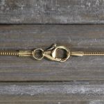 Goldkette als Schlangenkette in Gelbgold 750 / 18K, 42 cm lang, 1,2 mm breit, Gewicht ca. 4.5 g.