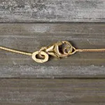 Goldkette als Tondakette in Gelbgold 750 / 18K, 45 cm lang, 0,8 mm breit, Gewicht ca. 3.6 g.