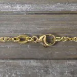 Armband als Singapurkette in Gelbgold 750 / 18 Karat, 19.5 cm lang, 2.4 mm breit, Gewicht ca. 2.2 g.