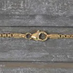 Goldkette als Venezianerkette rund geschlagen in Gelbgold 750 / 18K, 60 cm lang, 2 mm breit, Gewicht ca. 16.5 g.