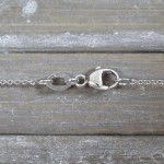 Goldkette als Ankerkette rund Weißgold 375 / 9K, 42 cm lang, 1,1 mm breit, Gewicht ca. 1.9 g.