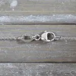 Goldkette als Ankerkette rund in Weißgold 375 / 9K, 55 cm lang, 1,1 mm breit, Gewicht ca. 2.4 g.