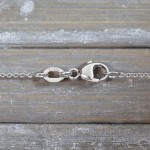 Goldkette als Ankerkette rund in Weißgold 750 / 18K, 50 cm lang, 1,1 mm breit, Gewicht ca. 2.8 g.