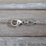 Goldkette als Ankerkette rund in Weißgold 750 / 18K, 55 cm lang, 1,3 mm breit, Gewicht ca. 4 g.