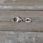 Goldkette als Panzerkette flach in Weißgold 750 / 18K, 34 cm lang, 1,1 mm breit, Gewicht ca. 1.8 g.