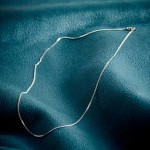 Goldkette als Panzerkette flach in Weißgold 750 / 18K, 60 cm lang, 1,4 mm breit, Gewicht ca. 5.5 g.