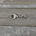 Goldkette als Panzerkette flach in Weißgold 585 / 14K, 42 cm lang, 1,1 mm breit, Gewicht ca. 2 g.