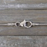 Goldkette als Schlangenkette in Weißgold 585 / 14K, 34 cm lang, 1,4 mm breit, Gewicht ca. 4.2 g.