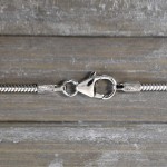 Goldkette als Schlangenkette in Weißgold 585 / 14K, 34 cm lang, 1,6 mm breit, Gewicht ca. 4.8 g.