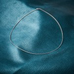 Goldkette als Tondakette in Weißgold 375 / 9K, 42 cm lang, 1 mm breit, Gewicht ca. 3.4 g.