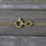 Goldkette als Panzerkette flach in Gelbgold 375 / 9 Karat, 36 cm lang, 1.2 mm breit, Gewicht ca. 1.6 g.