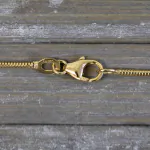 Goldkette als Schlangenkette in Gelbgold 375 / 9K, 65 cm lang, 1,4 mm breit, Gewicht ca. 5.3 g.
