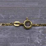 Goldkette als Figarokette diamantiert in Gelbgold 585 / 14K, 60 cm lang, 1,5 mm breit, Gewicht ca. 3.2 g.