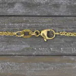 Goldkette als Zopfkette in Gelbgold 375 / 9K, 65 cm lang, 1,7 mm breit, Gewicht ca. 5.9 g.