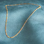 Goldkette als Panzerstegkette Bicolor in Gelbgold / Weißgold 333 / 8K, 55 cm lang, 2,5 mm breit, Gewicht ca. 5.3 g.